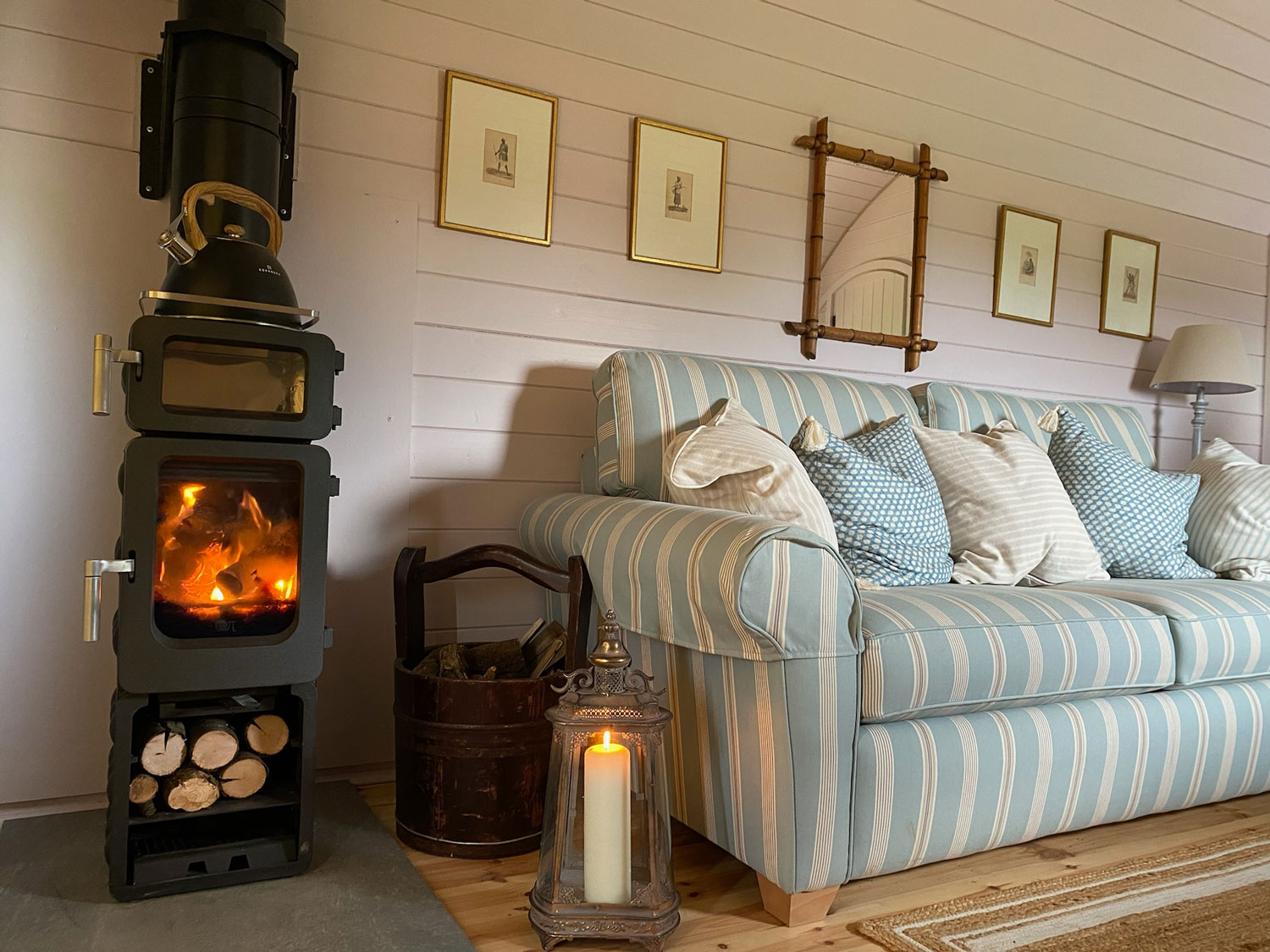 Cosy wood burner in the Cornflower luxury cabin
